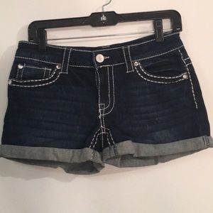 Dark blue Knox Rose shorts.